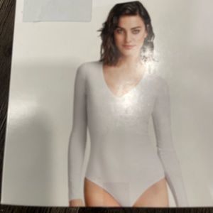 Wolford bodysuits, dresses, tops